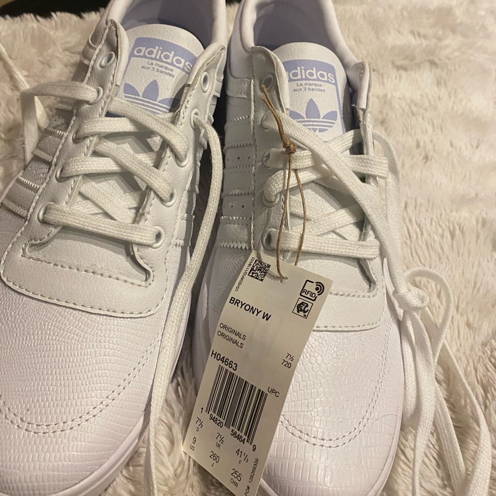 Adidas sneakers! White sneakers with purple accent colors:)